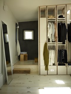 The second floor is laid out with almost nautical efficiency. Behind the closet is the bathroom.