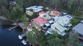 Only a Drone Could Capture How This House Fits on a Lot That’s Less Than 20 Feet Wide - Photo 3 of 4 -