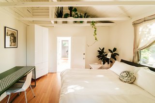 The guest suite, often rented out to visitors and tourists, also incorporates plants and greenery.