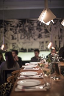 A furniture showroom and a popular farm-to-table bistro, Wood in Stockholm is a cozy space furnished with many products that are for sale.