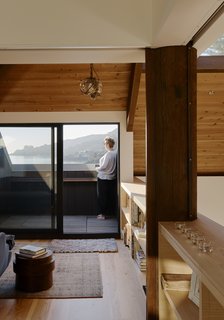 The light near the roof deck is by Roll & Hill. 