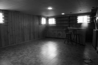 Midcentury Mashup: A 1950s Ranch House in Chicago Gets a Palm Springs-Style Butterfly Roof - Photo 10 of 15 - After contemplating adding a second floor above the kitchen to accommodate the master suite, Delano decided that situating it on the lower level, where the rec room and bar had been, was a better—and more affordable—choice 