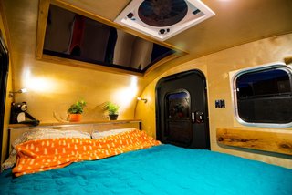The standard trailer comes with a four-inch-thick, dual density foam mattress. 