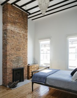 Three fireplaces were rebuilt, including in the master bedroom. The flues were relined in stainless steel to make them operable.