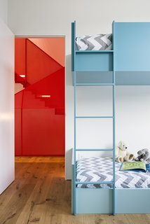 After a Renovation, a Classic San Francisco Victorian Is Now Bursting With Light and Color - Photo 7 of 15 - The daughter’s bedroom occupies the bay-windowed space that was once the living room. The custom bunkbed, painted in Spring Rain by Benjamin Moore, is by Myers Cabinetry. Dermot Barry was the project’s general contractor and architect Paul Endres was the structural engineer.