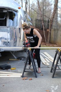 "When it came to the actual build of the Airstream, I did much of the construction and Jason did the plumbing and electrical work," states Sheena. "We renovated in two phases. After living in the first set-up for four months, we decided we needed to change things around so we spent an additional three months moving the bed and living space around and added a second work area."
