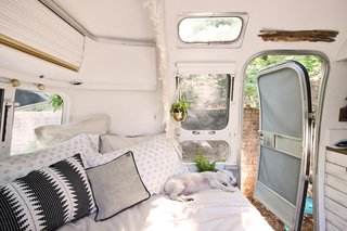 "We are really happy with how the space turned out, but if we were to change one thing, it'd be a bigger bed. We currently have a full size bed and although it works, we'd rather have a king."
