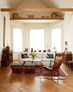 Legendary Textile Artist Kay Sekimachi’s Renovated Berkeley Victorian Is a True Creative Haven - Photo 2 of 6 - The main living area features pieces by George Nakashima and Sam Maloof. Japanese tansu cabinets frame the space, each adorned with artwork and souvenirs from nature.