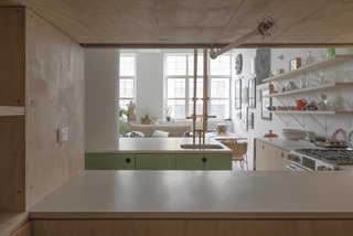 New Affiliates transformed Victoria Bartlett’s 1,000-square-foot loft in Bedford-Stuyvesant, Brooklyn, using everyday materials like brass and plywood. The shelves are made with Home Depot hardware.