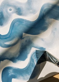 Rebecca Atwood’s pillows, duvets, wallpapers, and other designs are made in many places, from Rhode Island to India, but almost all of them start as ideas in her sketchbook. The Tidal Wave fabric series is based on painted squiggles she did in 2016. 