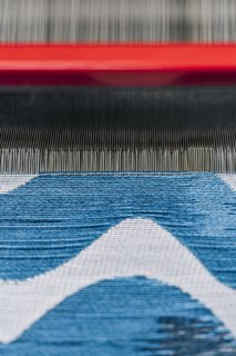<b> 9 Insert the Weft</b> After each pass of the weft pick (a single yarn crossing the warp), the yarns are "beaten" or combed into place to ensure even tension. The weft pick moves so swiftly across the warp that it’s sometimes difficult to track with the human eye. 