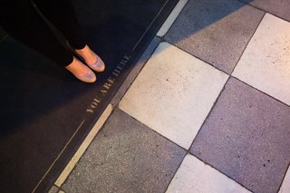 Paving the Way For Iconographic Landmarks - Photo 16 of 17 - The charcoal and cream colors used outside the United Artist Theatre are timeless and iconic.