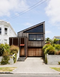 The front entrance leads to the house’s hallway, or "circulation spine."