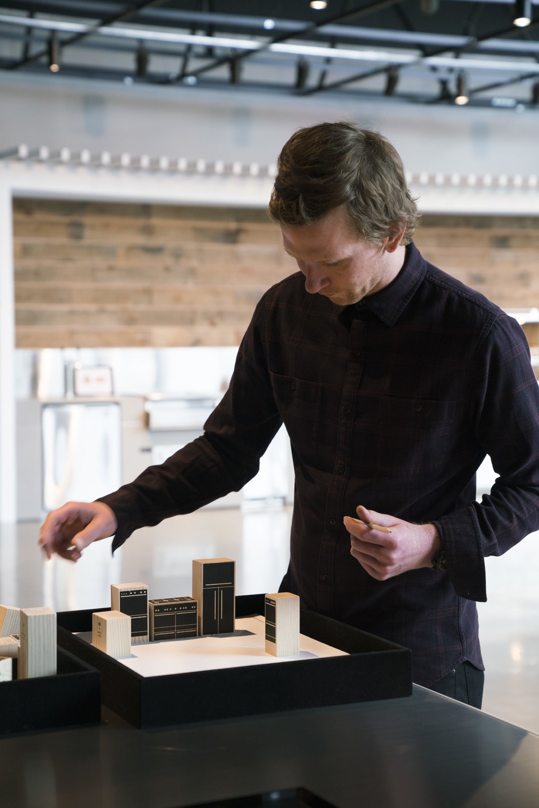 The showroom’s “plan and choose” area allows designers to create three-dimensional floor plans with blocks that represent Fisher & Paykel’s different offerings.