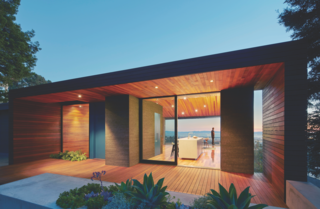 The form of the tube echoes the wisps of fog that hug the coastline: a wavy Western Red Cedar ceiling that proves to be a show-stopper. 