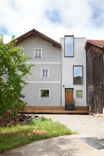 From the outside, the tower hints at the minimalist transformation within. 