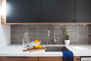 Designer Karen Nepacena used Caesarstone’s "Nougat" color for the countertops in this mid-century home. 