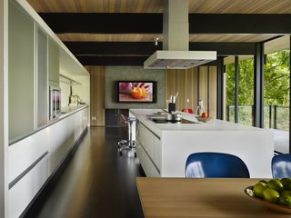 For this project, Lisa Chadbourne worked with Caesarstone to build a large kitchen island in sections. "We spanned the distance with an internal metal structure so we could keep our counter light but strong," she explains. 