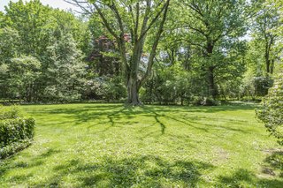 The .9-acre property offers lush privacy. 