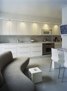 Hariri created spots in every area of her home for quiet, intimate reflection. Even the kitchen has a sofa in the corner, a space where Hariri enjoys her coffee along with the morning news. 