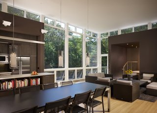 Bensen always wanted a large dining table that seats ten people. She made sure there was room for one at the Woodland Dune house, and often, all ten seats are filled. 