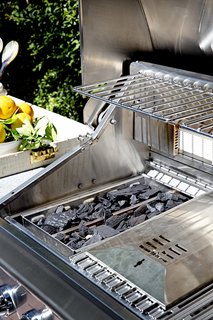 Chef Ludo loaded up the grill’s smoker and charcoal tray with briquettes to add the flavors of a traditional barbecue. 
