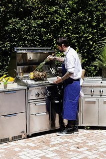 Chef Ludo prepared lamb shawarma on the grill’s rotisserie—which can hold up to 50 pounds of meat—while roasting vegetables on the grills other surfaces. 