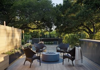 Janus et Cie Amari Low Back lounge chairs provide a place for gathering on the roof deck.