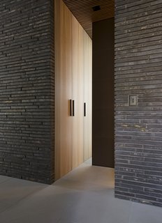 The handmade bricks found throughout the exterior and interior of the house are by Danish company Petersen Tegl.
