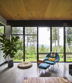 The couple snagged their Womb chair, a floor model, on sale.