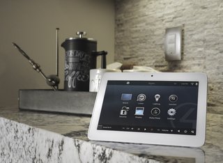 Architectural designer, Karen Sealy, calls Control4 the "brain" of the home. From lighting to shades, garage doors to smart locks, Control4 can manage it all. 