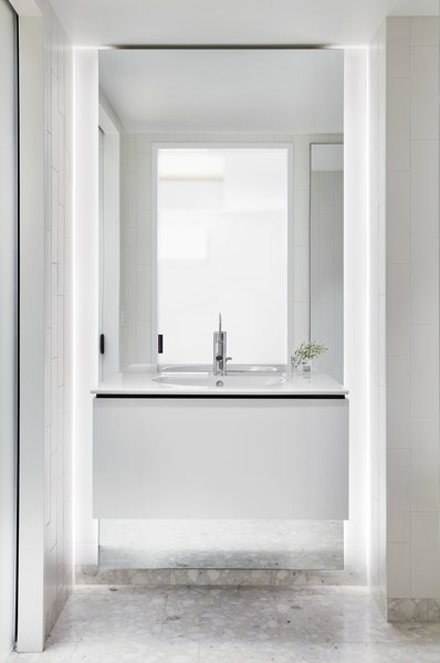 In the bathroom, the vanity and sink are by Duravit.