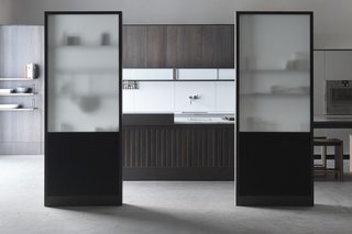 The Henrybuilt Functional Partition Wall provides elegant spatial screening or division of space within the kitchen. It provides both privacy and transparency, creating distinct spaces without dividing them harshly. 