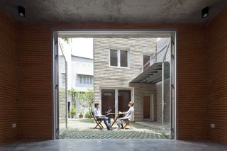 The open courtyard brings warmth and light into the home.