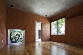 Locally sourced bricks are used for the internal walls.