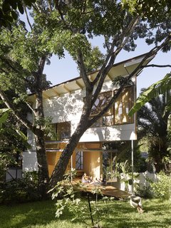 The homeowners wanted a space to accommodate their interests: gardening, looking after their ducks, or relaxing in the shade provided by the canopy of trees on the property.
