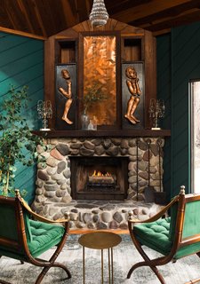 "The green room is a space I created for the members to sit back and enjoy themselves after a hard day's work," Sutherland continues. "I painted the walls an emerald green and furnished the room to be classic and fun."