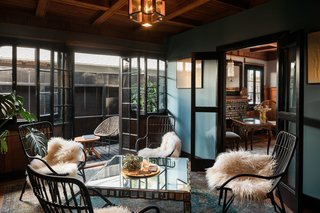 "I transformed the dining room into a meeting room, which has the ability to close off from the rest of the house for privacy," Sutherland adds. 
