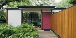 When Rob and Mary Lubera started pulling threads to uncover the origins of their new home—the lone midcentury house amid rows of Tudor Revivals in suburban Detroit—not even architecture scholars could have anticipated what they would find. Theirs is the last surviving residence by Alexander Girard (1907–1993), a modernist visionary who made his name in textiles but tried his hand at virtually everything, architecture included. The shoji-like laminate screens, seen in the entryway, are characteristic of his Japanese-influenced work. 