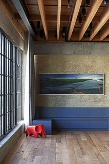 An Eames elephant sits by a kitchen nook; the painting is by Michael Shankman. 