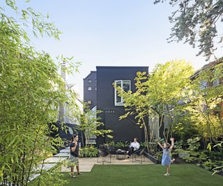 McLean chose artificial turf for the front yard, where Hana Bea and her sister, Pilar, 9, play as Sharen looks on. 