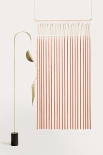 Presented during Milan Design Week 2018, this sound sculpture, Melodicware, contains brass chimes of different lengths that play pleasant musical notes. Swinging by breeze or touch, they release casual melodies inspired by Debussy. 