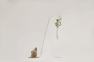 This kinetic sculpture is composed of small floating vases that celebrate natural beauty and equilibrium. "The project is inspired by the delicate harmony found in nature, where each part needs of the other in order to be balanced," says Bottoni.