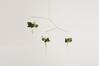 Another piece in Bottoni's Eden series, this hanging vase is constructed of glass tubes and handcrafted solid brass components. "The lightness of these simple elements highlights the beauty of the flowers and leaves, which truly complete the design," says the designer.