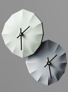Designed by Ayako Aratani—one half of the practice Aratani Fay—the porcelain Click-Clock has no digits, only sculpted lines for reading the time.