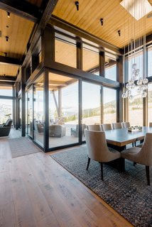 A magnificent corner sliding door unit opens up to expand the home to an outdoor deck.<br> "When you walk in and look at the mountains, the beauty is overwhelming," adds Pam. 
