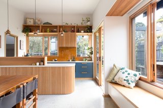 A connected dining area and kitchen allows for an open, airy feeling.