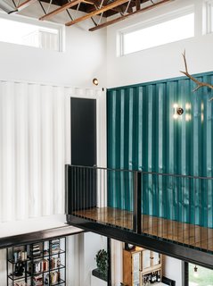 "One of the great surprises is the acoustic environment," Simmons says. "These are all hard surfaces and you get a bit of reverberation, but the corrugated walls help to disburse sound, so you don’t really get an echo. It actually has a kind of warm sound."