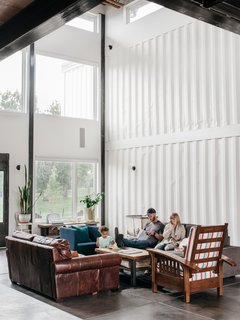 The Fosters unwind in the soaring, 960-square-foot great room. The family wanted plenty of space for hosting friends and events, as well as lots of bedrooms so they can rent the house to groups on Airbnb if they like.