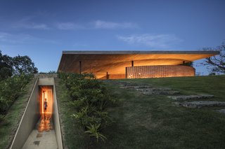 An Expansive Grass Roof Tops This Modern Brazilian Home - Photo 14 of 16 -